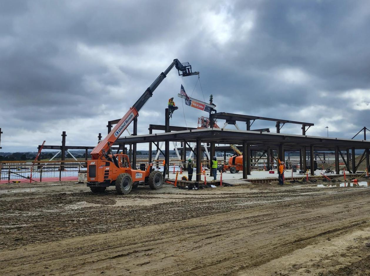 Then beam is moved into position.