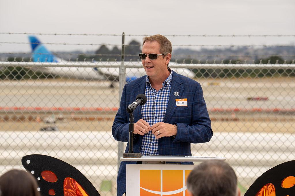 male speaker at terminal groundbreaking event