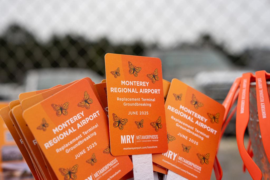 orange seed fans for terminal groundbreaking event