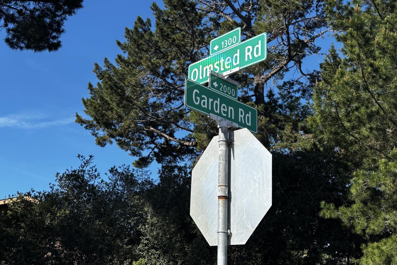 The street sign at the corner of Garden and Olmstead Road.